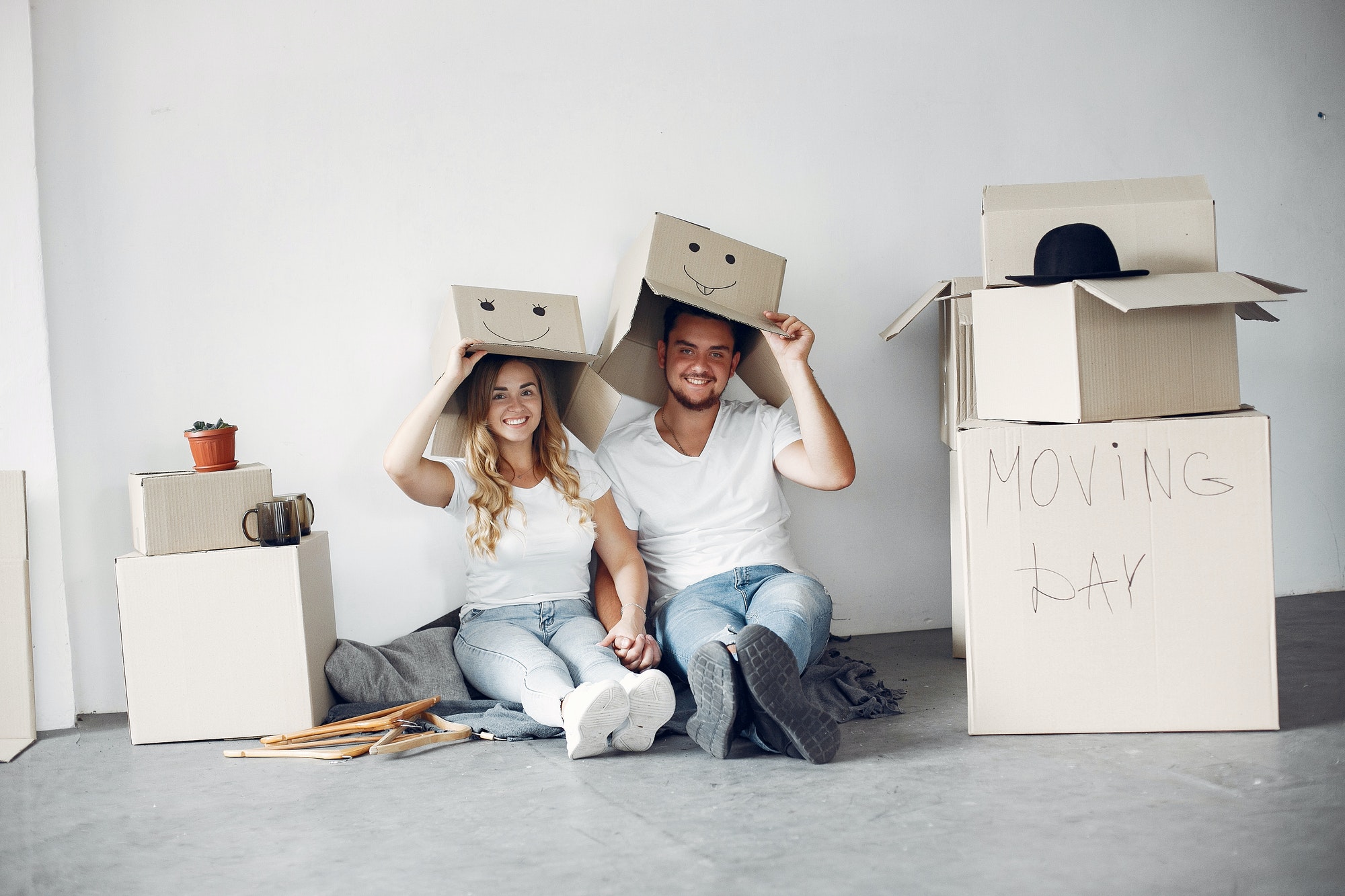 Couple moving and using a boxes
